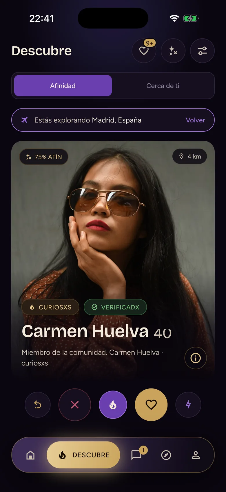 The Discover deck on Klambre: a full-screen profile card with its affinity percentage, the verified badge and the pass and like buttons